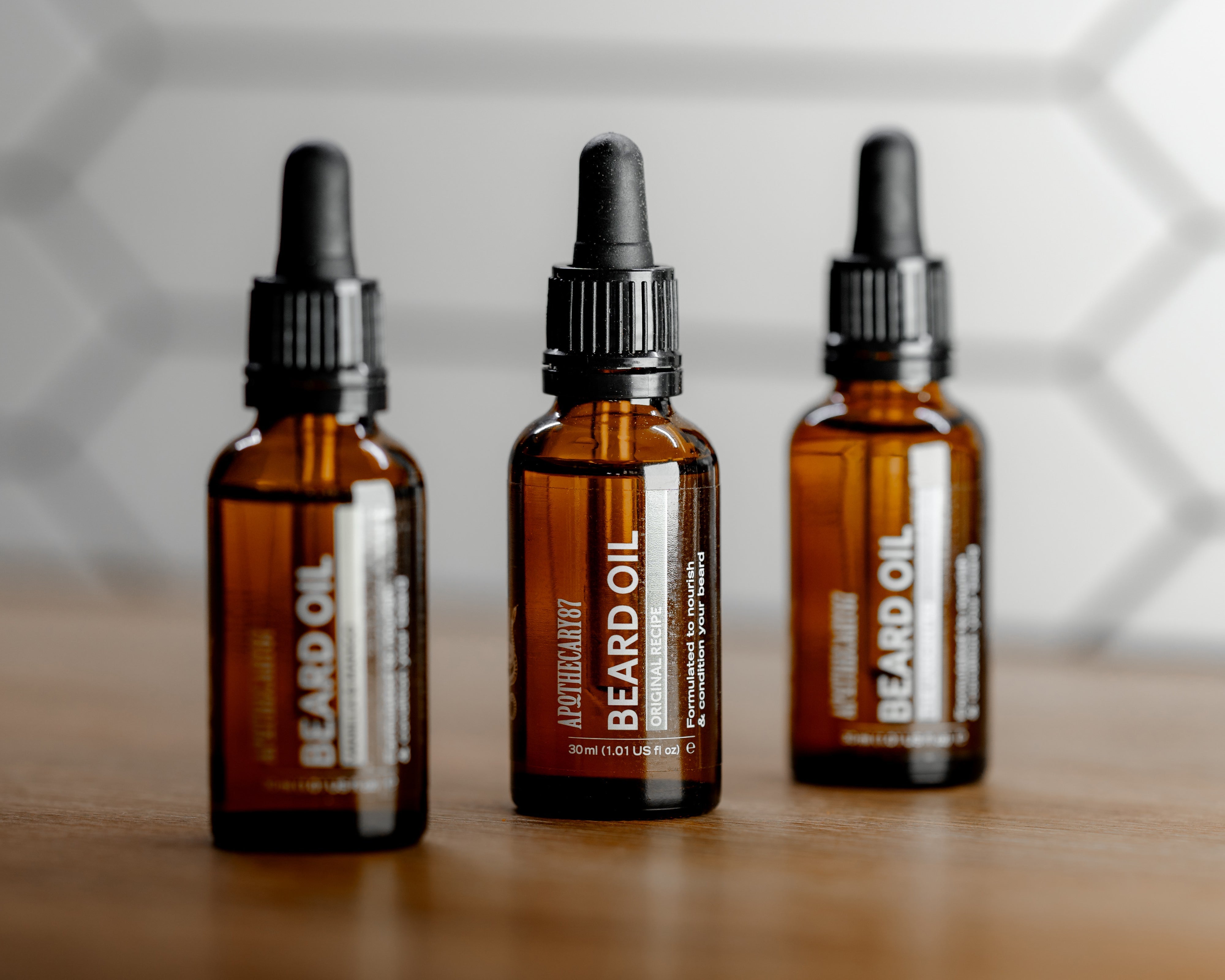 3 Apothecary 87 Beard Oils Lined Up