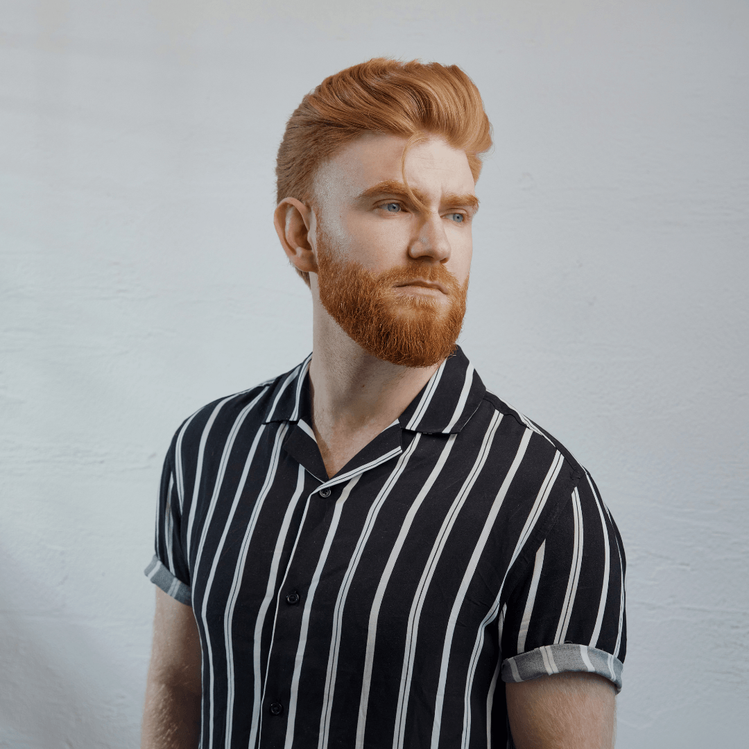 Apothecary 87 man with beard and pompadour. Predictions of the most popular hair styles for men in 2024