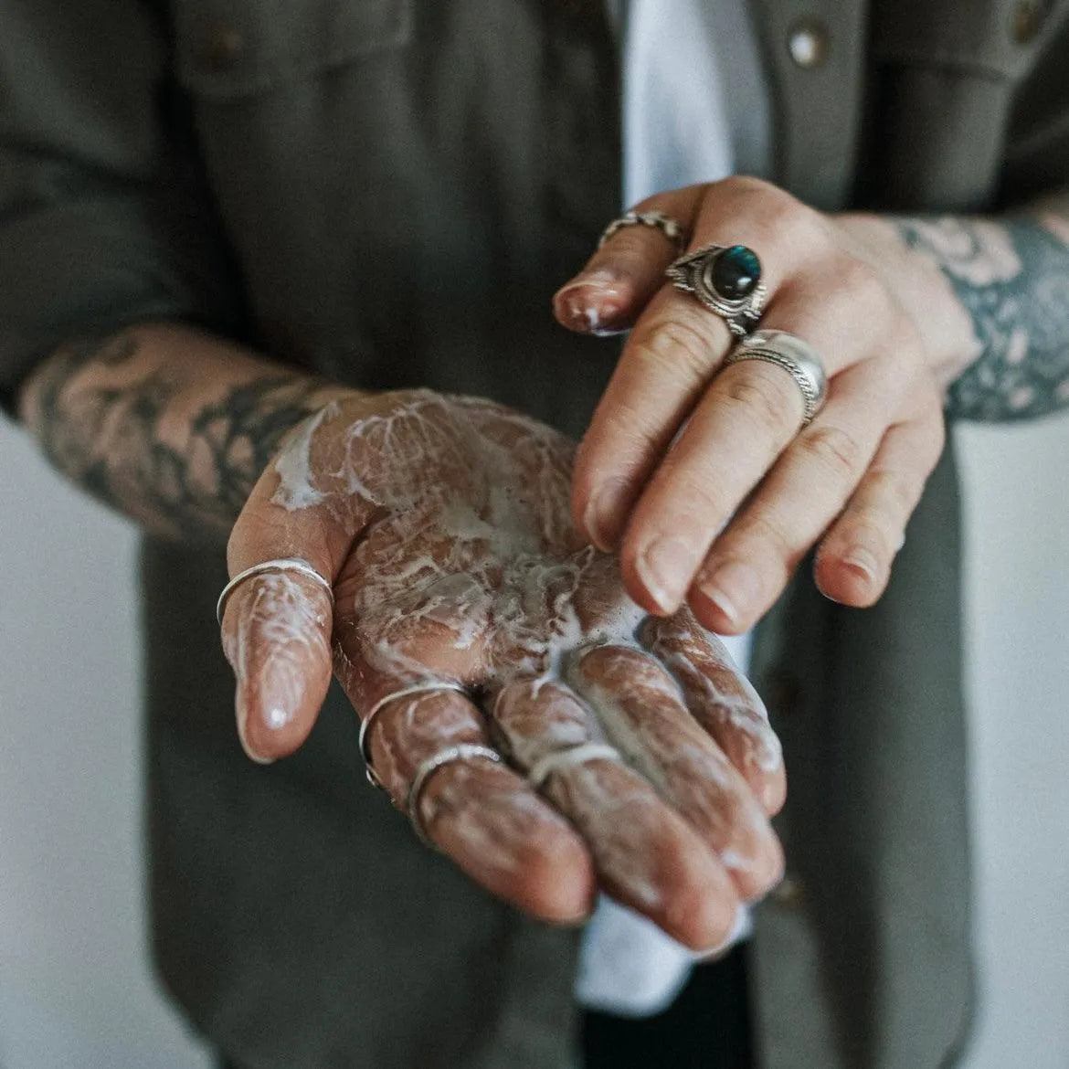 Apothecary 87 daily use Botanical Shampoo foaming in hands for cleansing hair