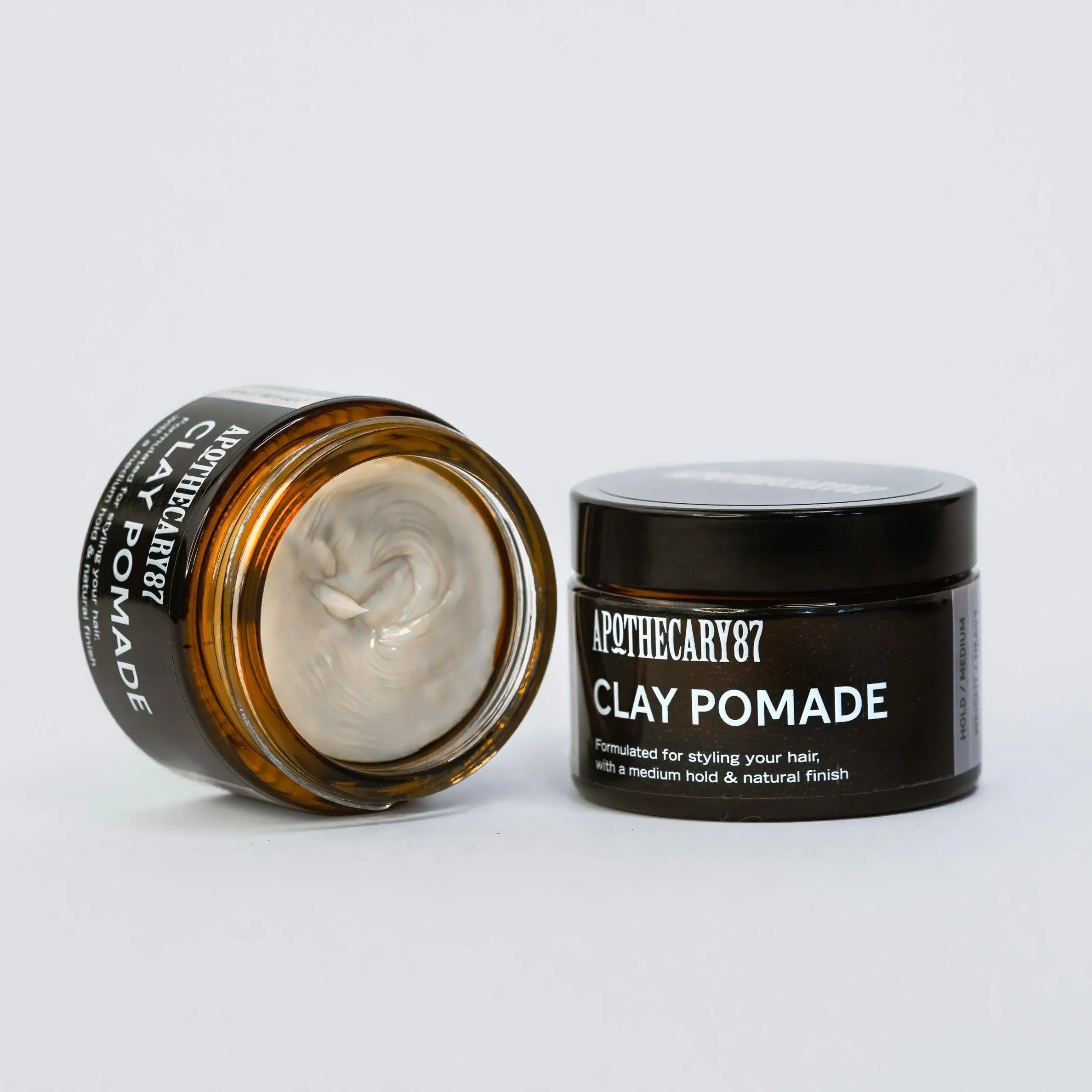 Apothecary 87 Clay Pomade 50ml (1.69 fl oz) jar, hybrid hair styling clay. Medium Hold | Natural Finish | Heavy Weight. Part of the Matte Hair Kit gift