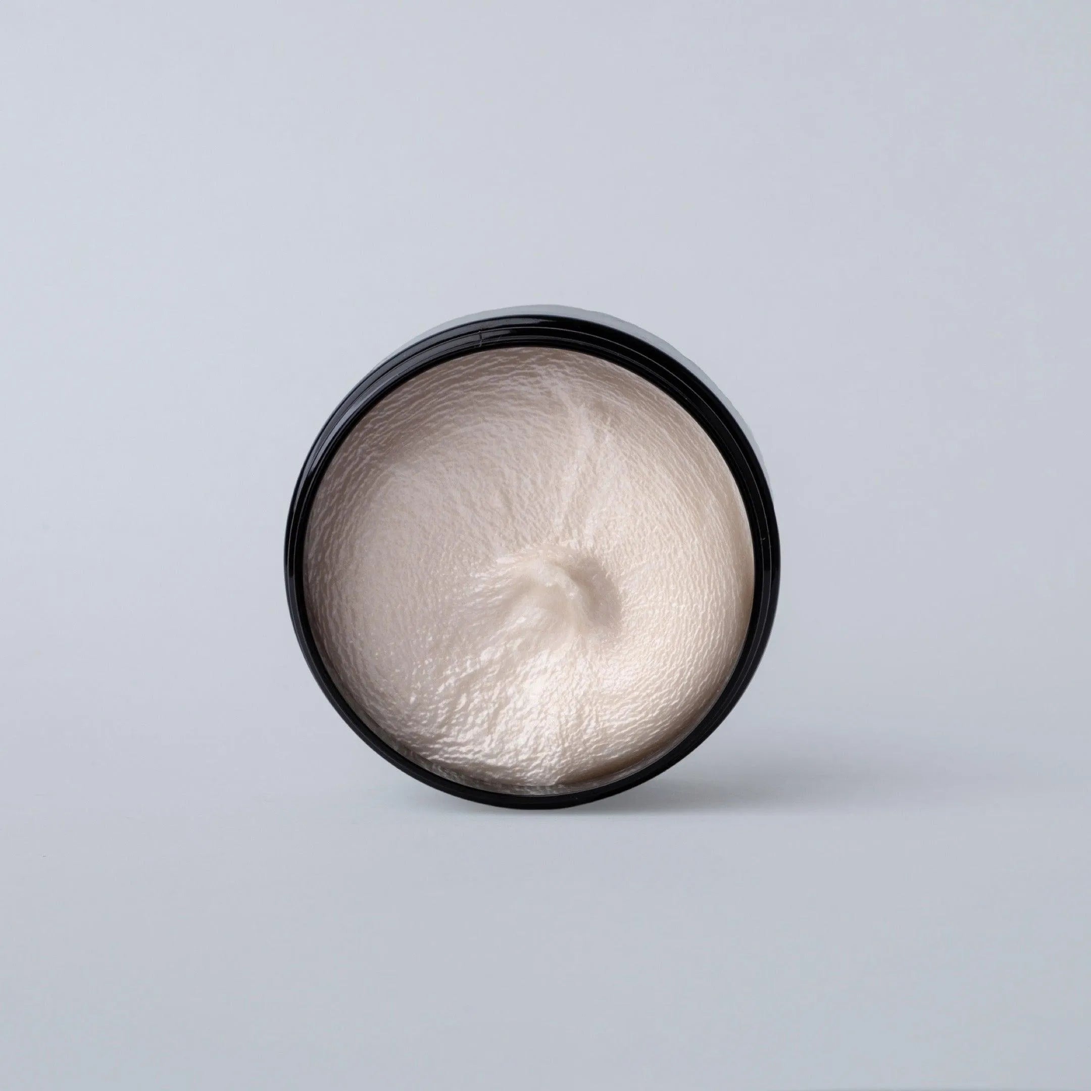 Apothecary 87 Shave Cream 100ml (3.38 fl oz) open jar, for rich lather wet shave. Fragranced with Sandalwood and Vanilla