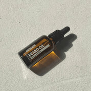 Apothecary 87 nourishing Beard Oil bottle on textured background