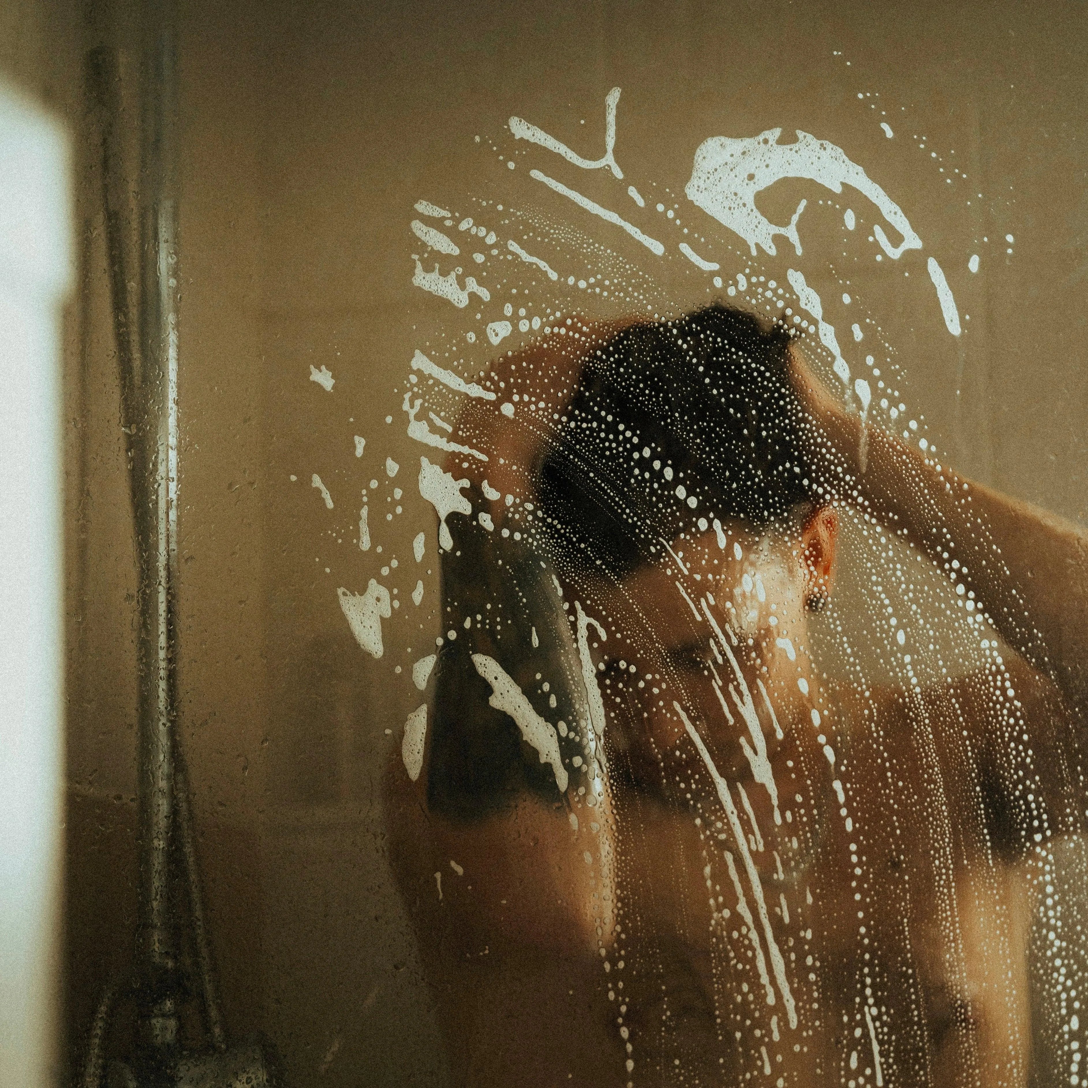 Apothecary 87 cleansing Botanical Shampoo used in shower by man for nourished hair